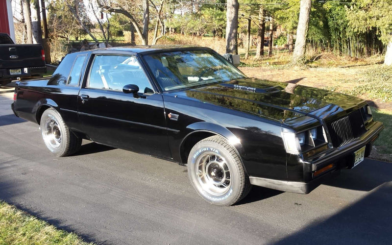 Black GM performance car staged at the drag strip