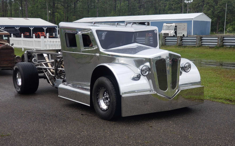 Polished custom hot rod running Boss Hog converters
