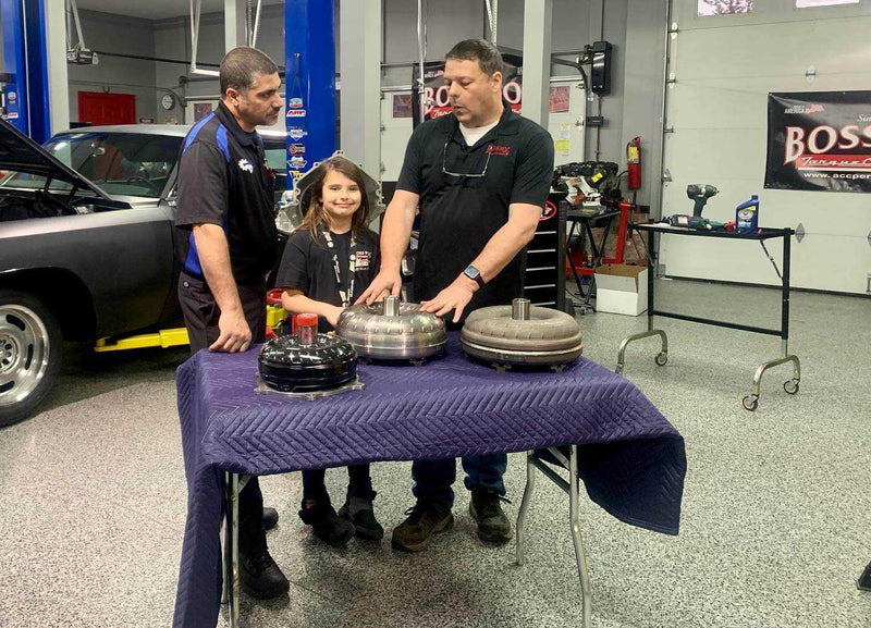 Boss Hog technicians building a torque converter