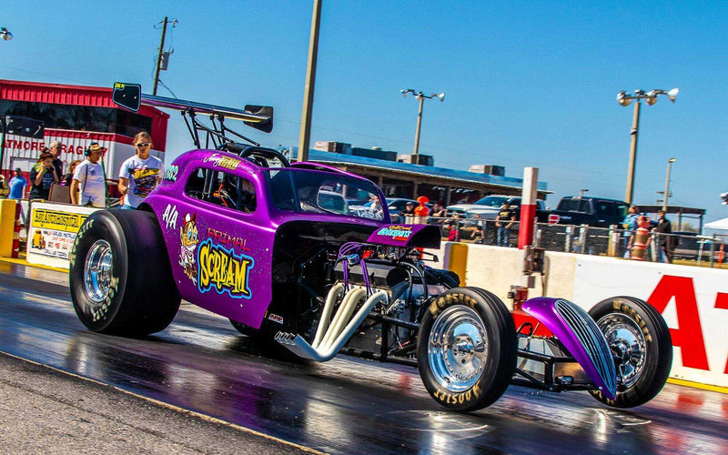 Purple Boss Hog dragster on the starting line