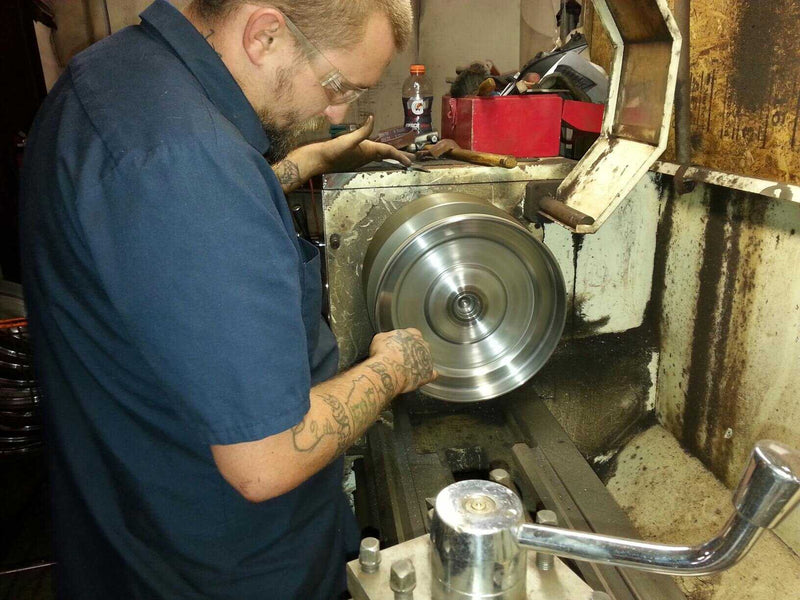 Technician balancing a torque converter